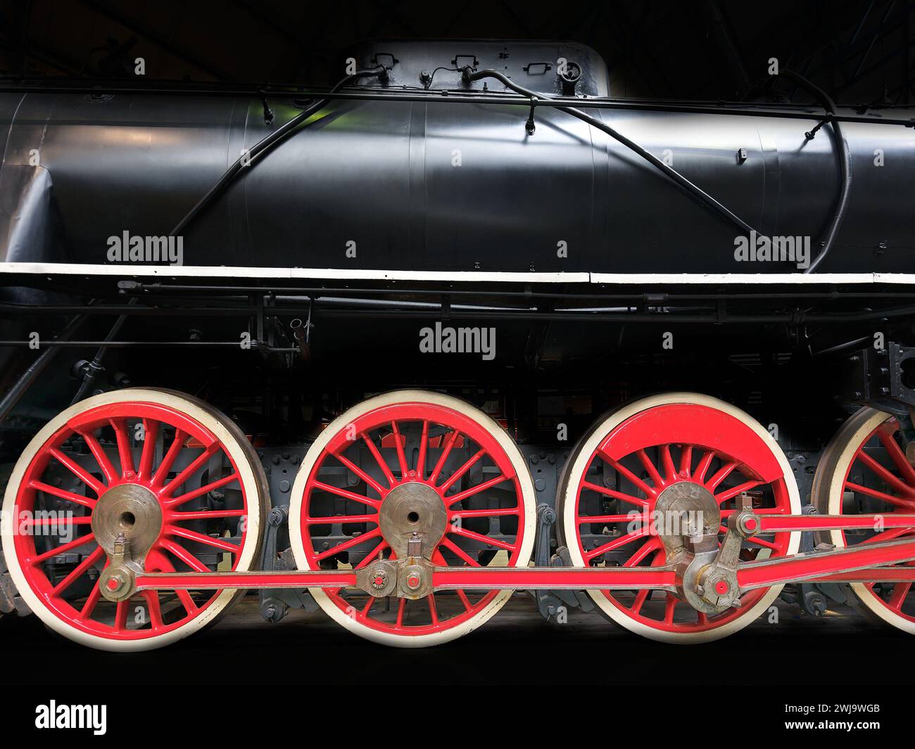 Red wheels of the KF1 7 engine, used  in China 1937; railway museum, York, England. Stock Photo