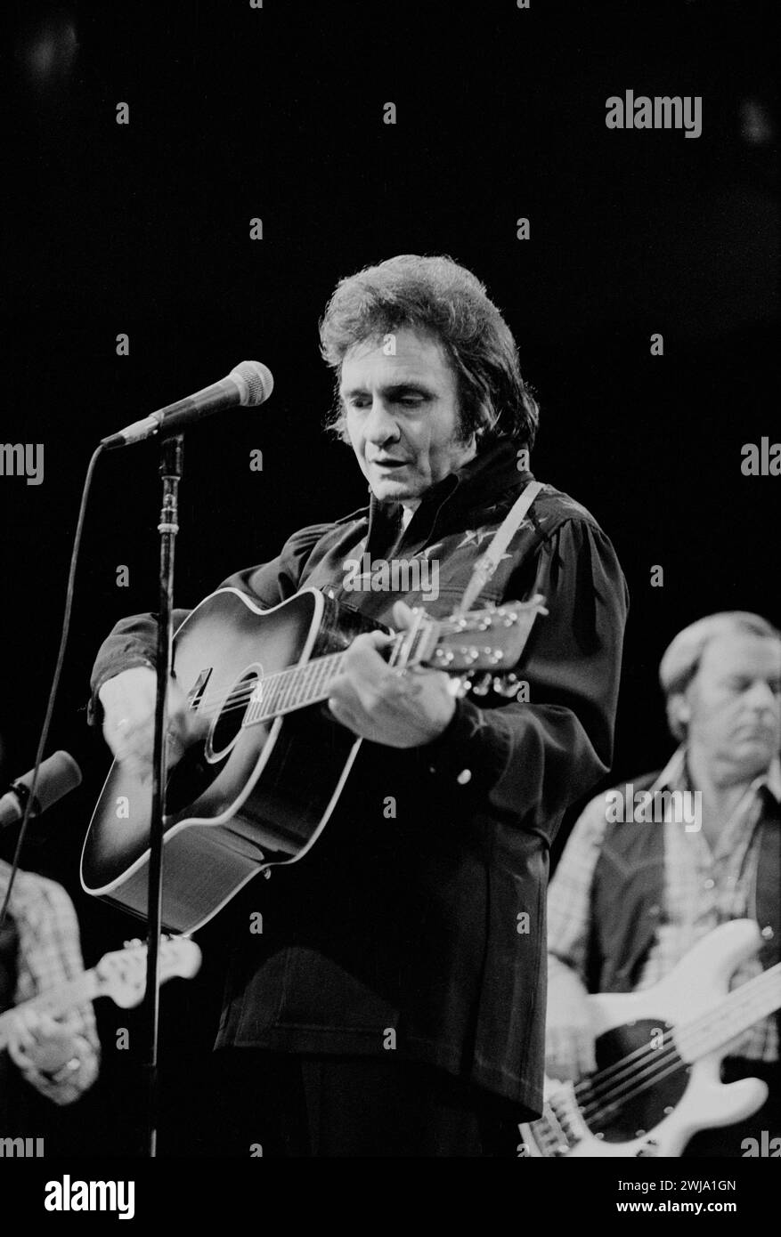 Johnny Cash on stage with guitar at Owings Mills, Maryland, 1977 - Leffler, Warren K., photographer Stock Photo