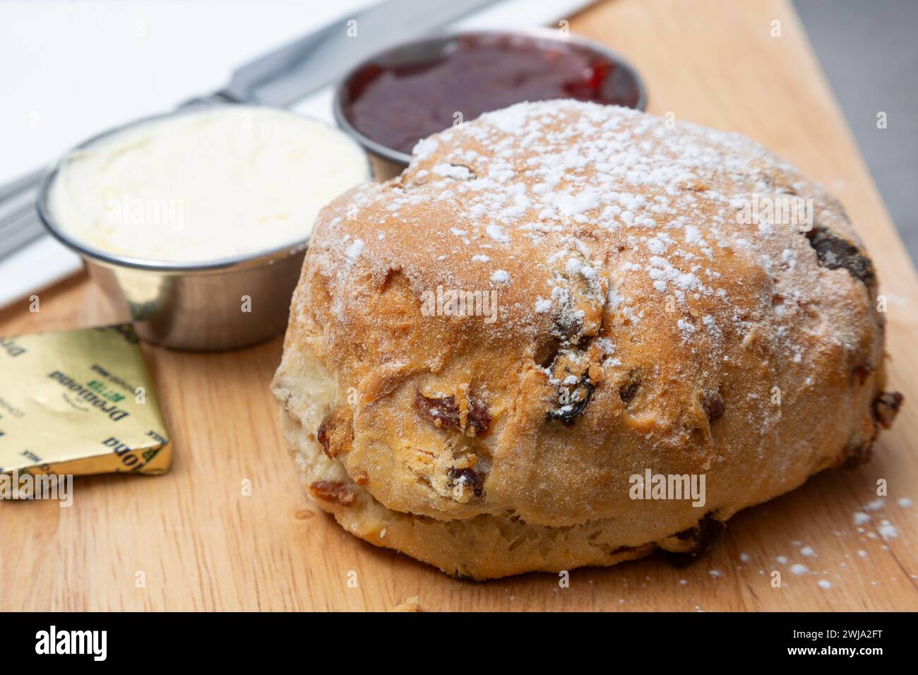 Fruit scone with cream and jam Stock Photo Alamy