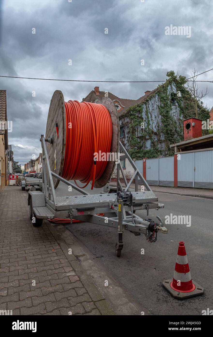 fiber optic cable reel on a roadside trailer Stock Photo