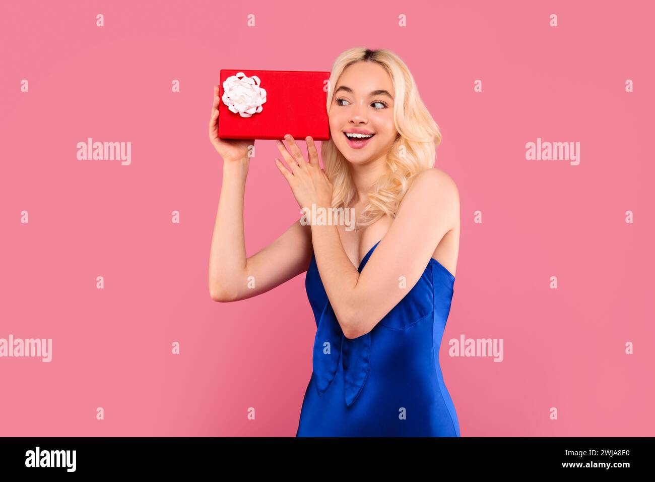Young woman surprised receiving hi-res stock photography and images - Alamy