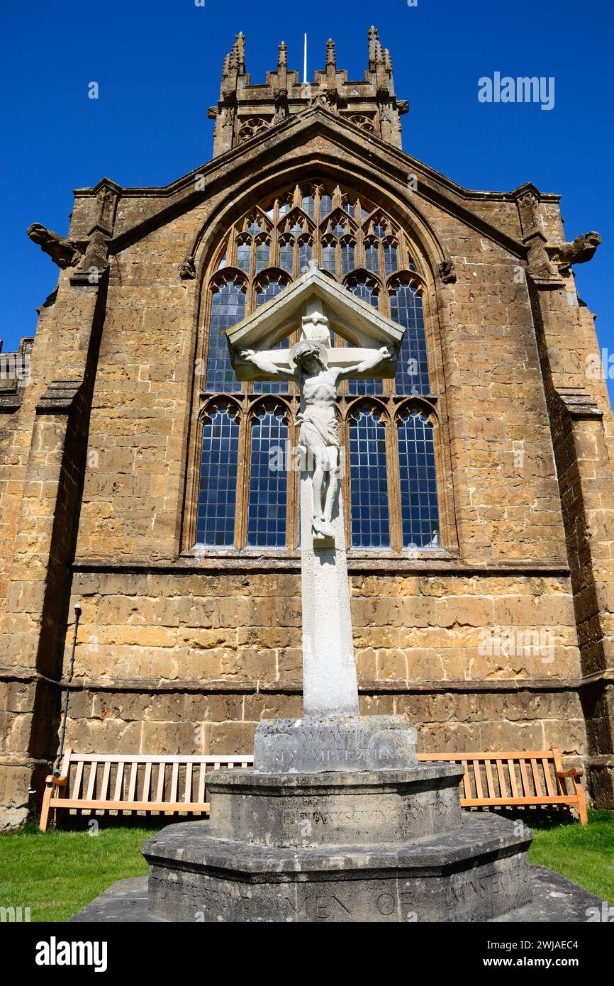 Front view of St Marys Minster Church in the town centre with the war memorial and crucifix in the foreground, Ilminster, Somerset, UK, Europe Stock Photo