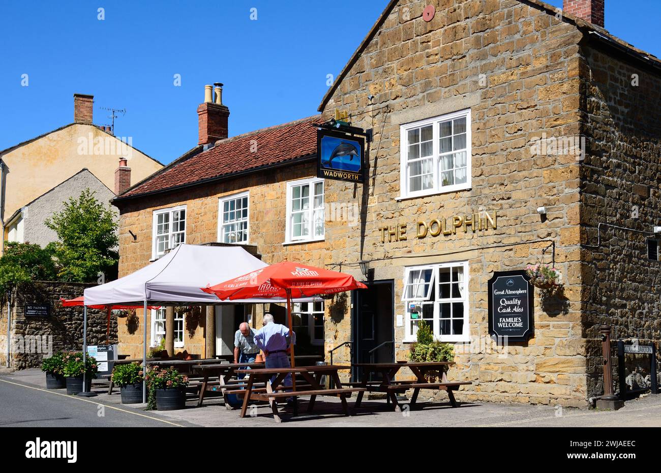 Front view of the Dolphin Inn along Silver Street in the town centre, Ilminster, Somerset, UK, Europe. Stock Photo