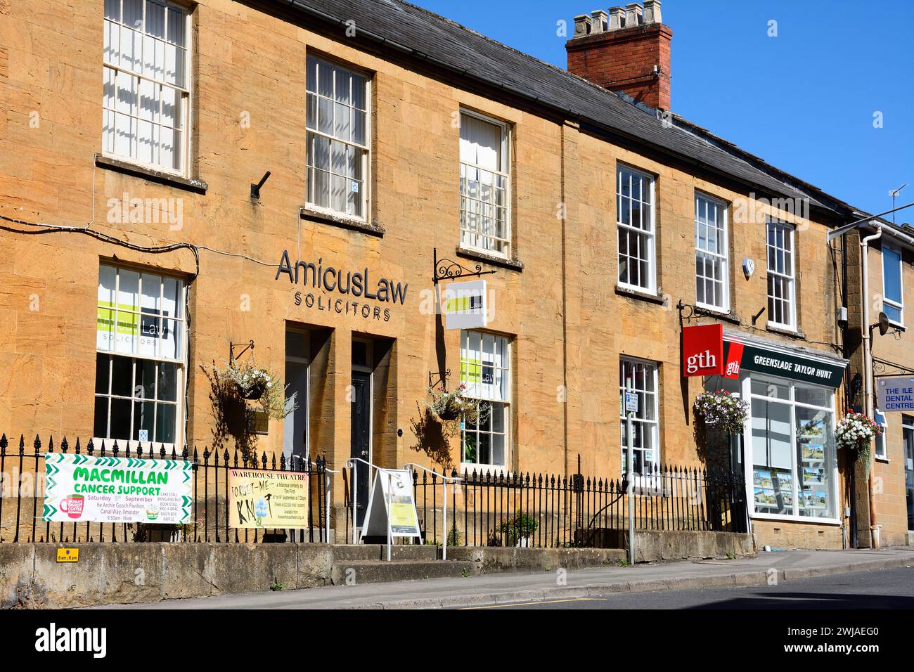 Professional businesses along East Street including a Solicitors an estate agent, Ilminster, Somerset, UK, Europe. Stock Photo