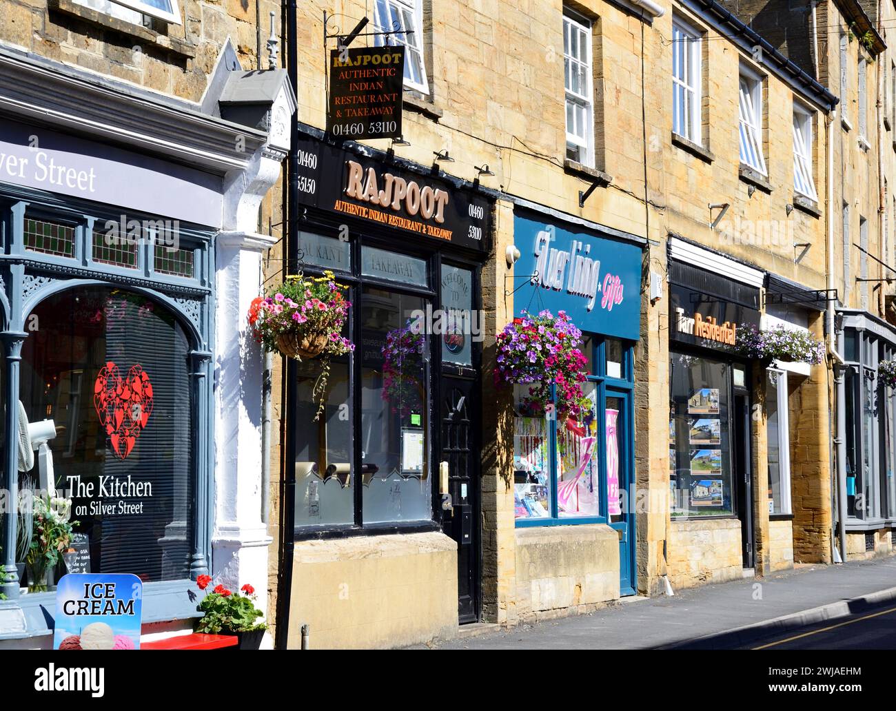 Traditional shops along Silver Street in the town centre, Ilminster, Somerset, UK, Europe.. Stock Photo