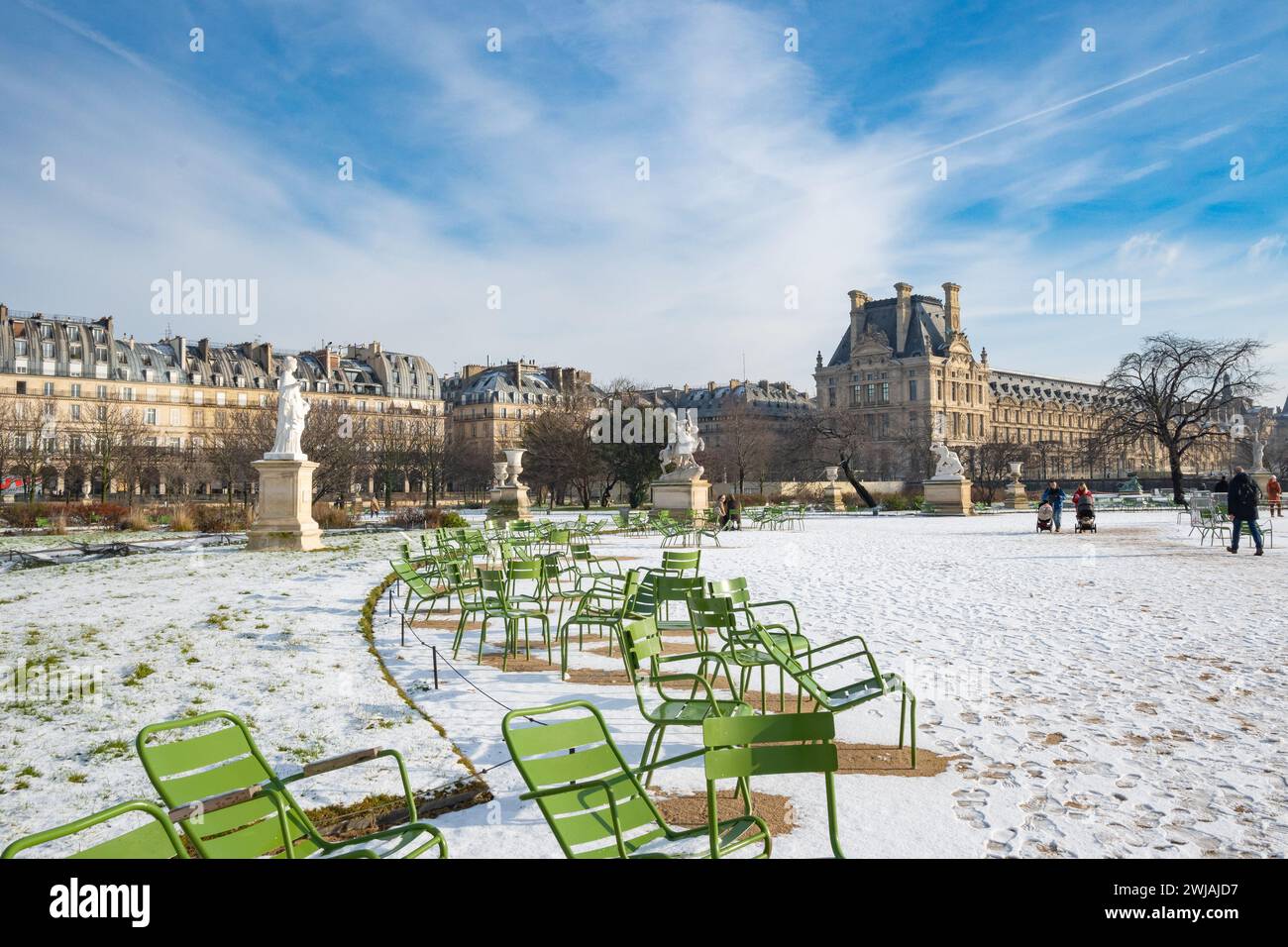 Paris, France, Snowy Tuileries gardens with classical statue in the ...