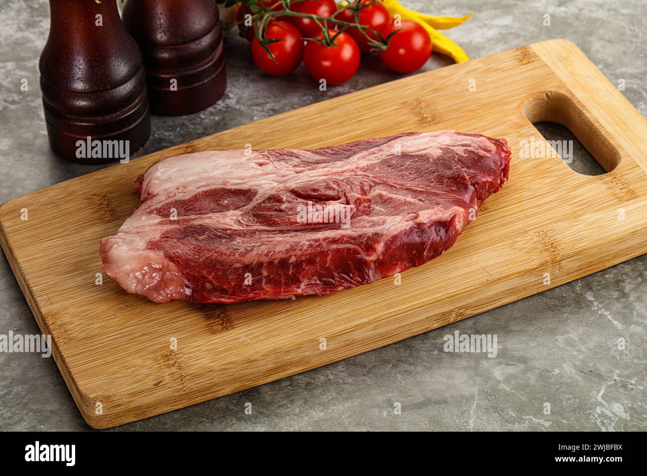 Raw beef chuck roll steak for grill Stock Photo Alamy