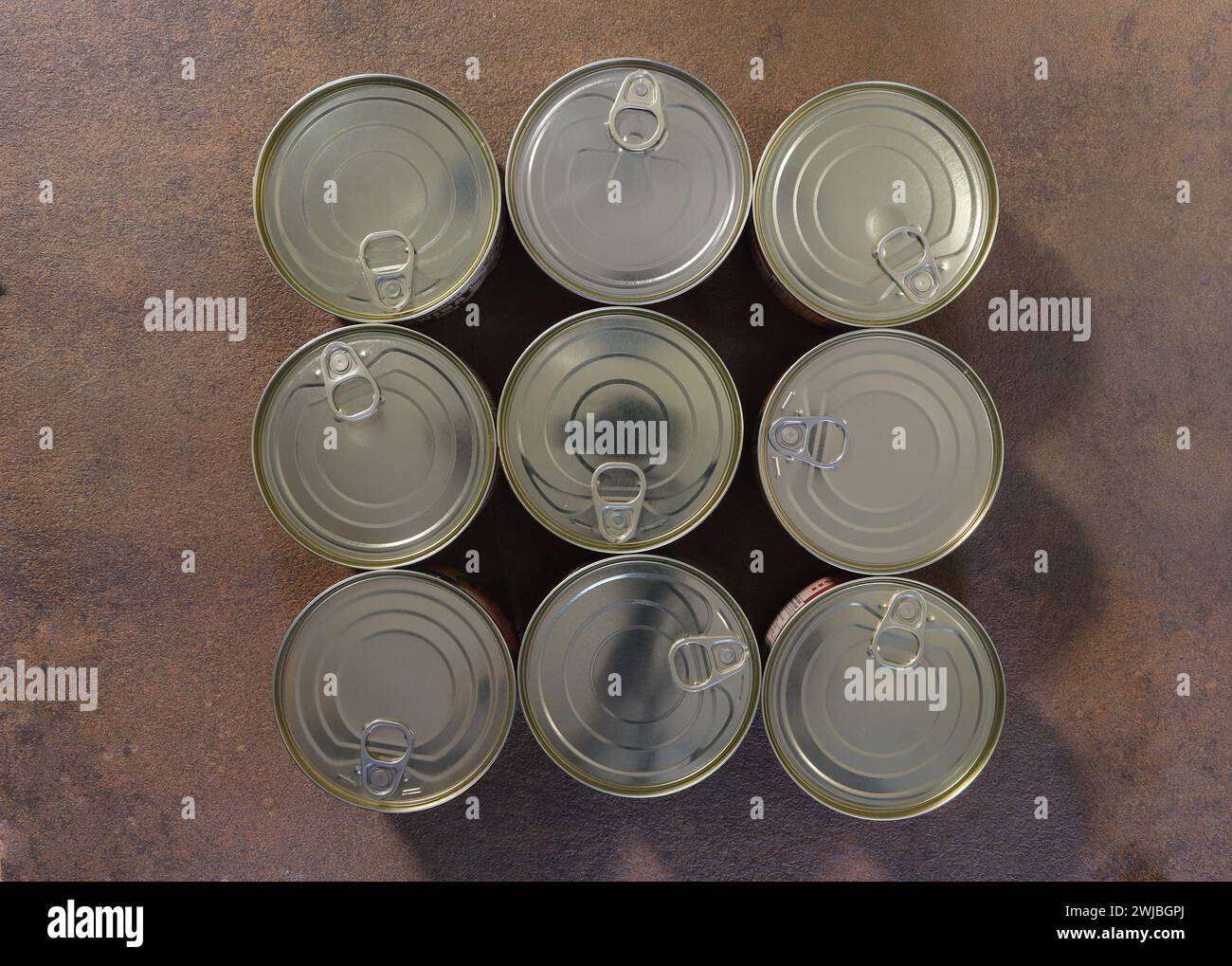 Tin cans,canned food,lids,on the table Stock Photo Alamy