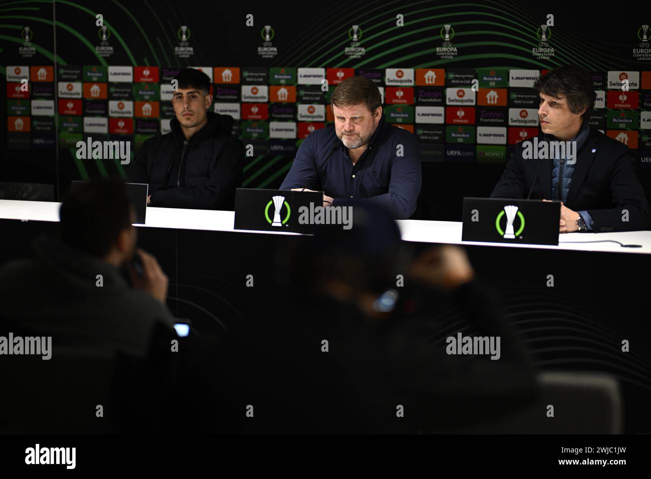 Budapest, Hungary. 14th Feb, 2024. Gent's Omri Gandelman, Gent's head coach Hein Vanhaezebrouck and Gent's communications manager Tom Vandenbulcke pictured during a press conference of Belgian soccer club KAA Gent, on in Budapest, Hungary. The team is preparing for tomorrow's game against Israeli soccer team Maccabi Haifa, the first leg of the play offs phase of the UEFA Conference League competition. BELGA PHOTO JASPER JACOBS Credit: Belga News Agency/Alamy Live News Stock Photo