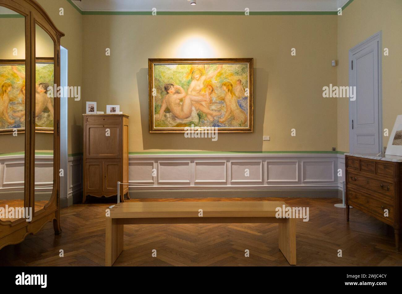 'Les grandes baigneuses' painting by Pierre Auguste Renoir on display