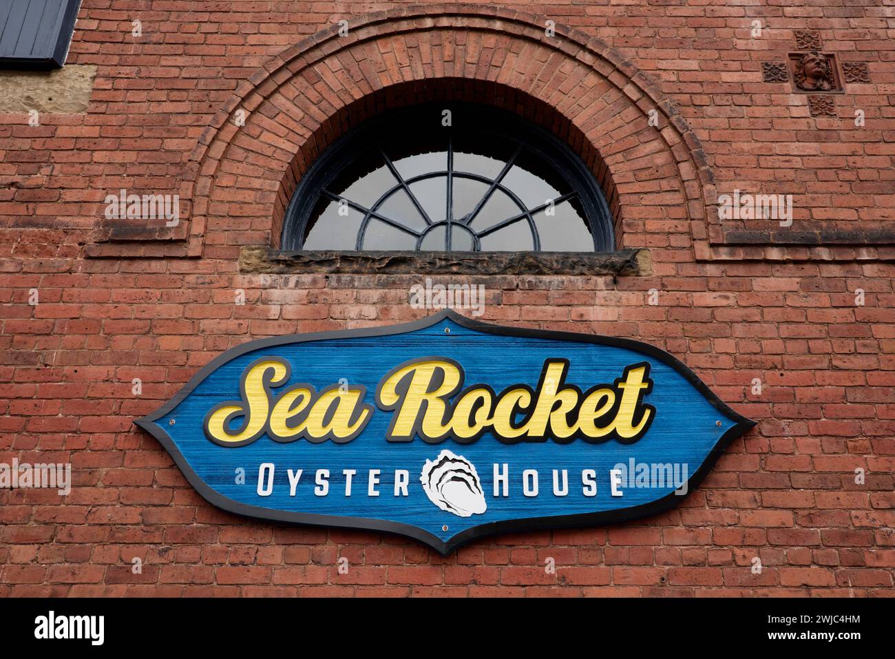 Colourful wooden sign for Sea Rocket Oyster House in Charlottetown