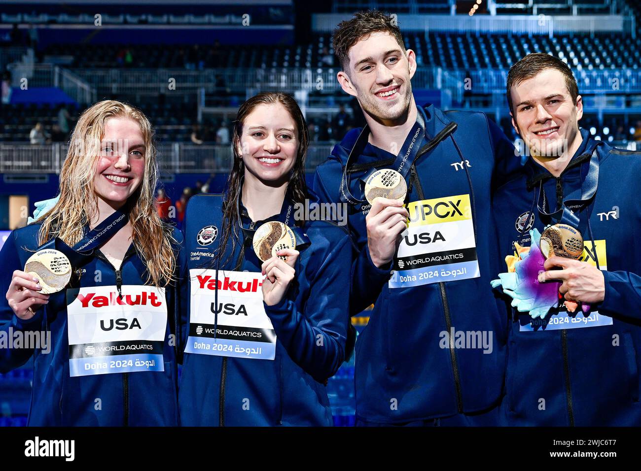 Doha, Qatar. 14th Feb, 2024. Team United States of America shows the gold medal after competing in the swimming 4X100 Medley Mixed Final during the 21st World Aquatics Championships at the Aspire Dome in Doha (Qatar), February 14, 2024. Credit: Insidefoto di andrea staccioli/Alamy Live News Stock Photo
