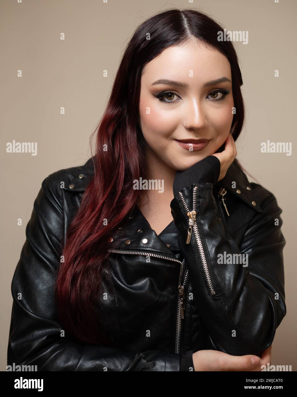 Woman in black leather jacket hi-res stock photography and images - Alamy