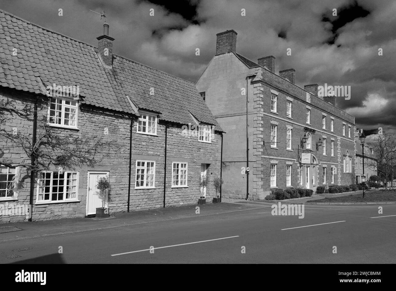 Spring Daffodils around the buildings of Folkingham village green