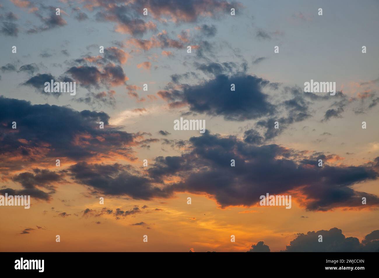sunset dramatic cloudy sky background on a summer evening Stock Photo ...