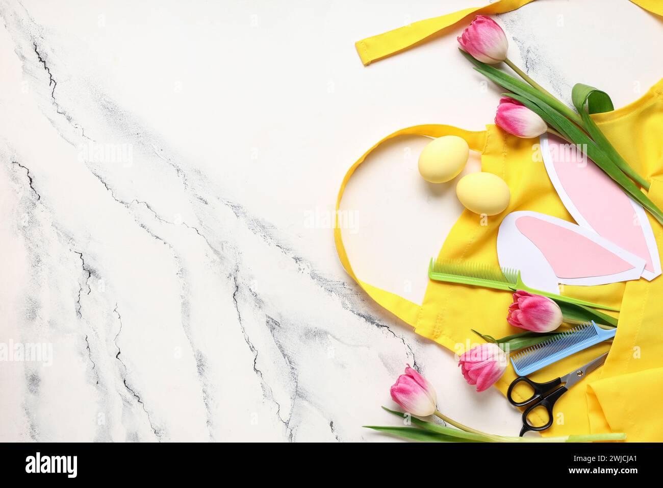 Composition with apron, hairdresser's supplies, Easter eggs and flowers