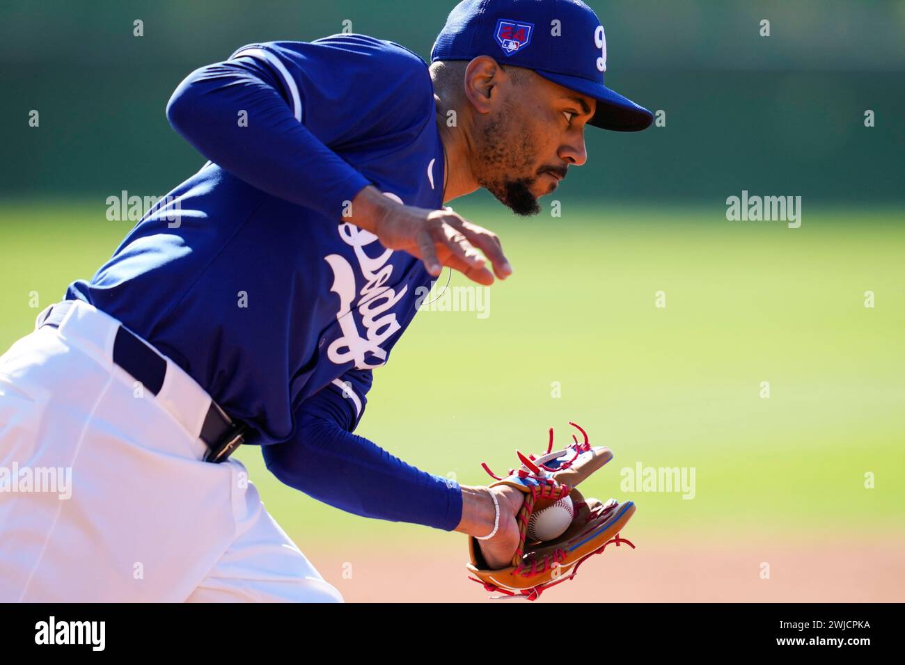 Los Angeles Dodgers right fielder Mookie Betts participates in spring