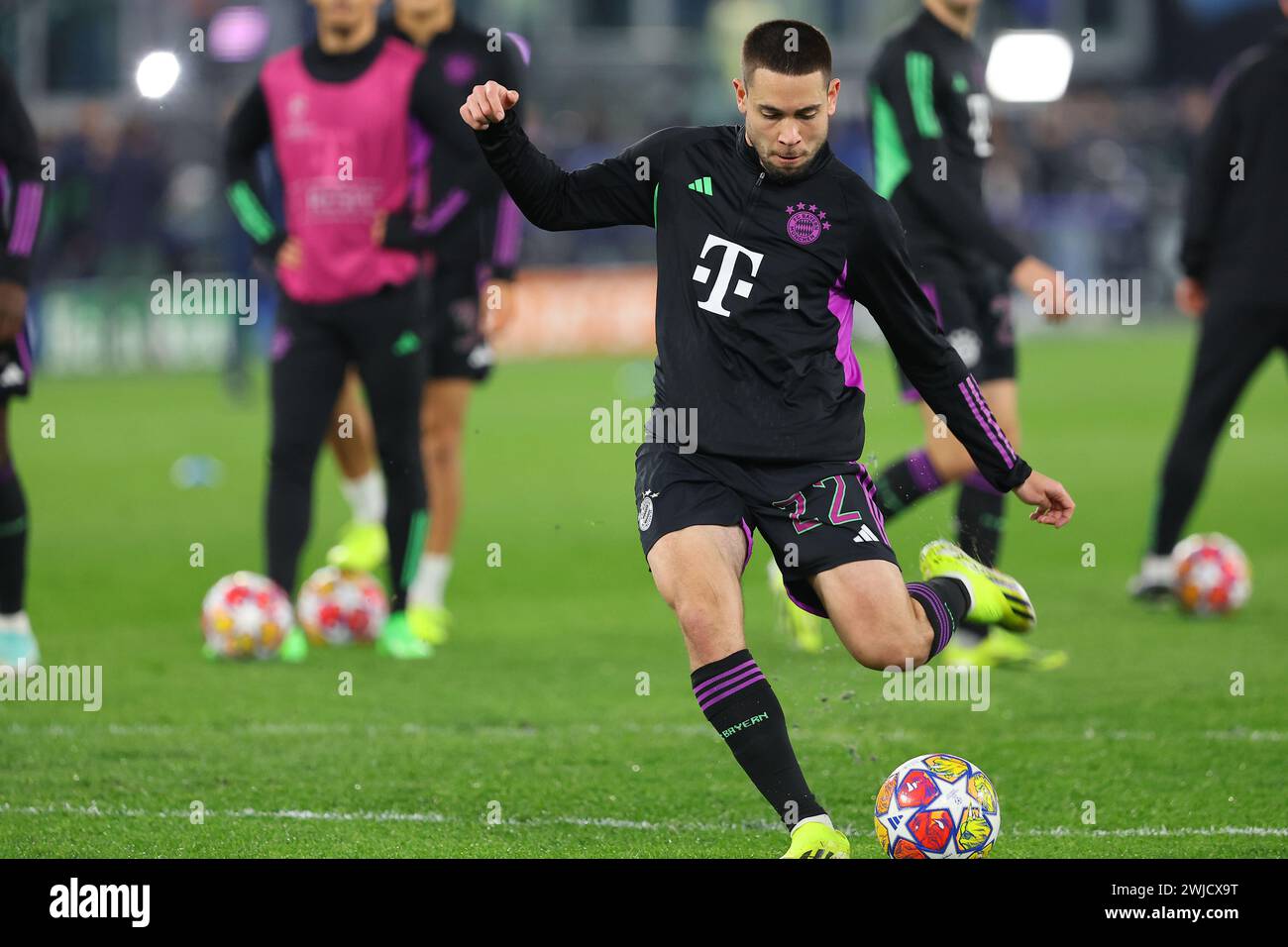 Rome, Italy. 14th Feb, 2024. Rome, Italy 14.2.2024: Raphael Guerreiro of Bayern Munchen during warm-up before the Uefa Champions League 2023-2024, round of 16 football match SS Lazio vs FC Bayern Mucnhen at Olympic Stadium in Rome. Credit: Independent Photo Agency/Alamy Live News Stock Photo