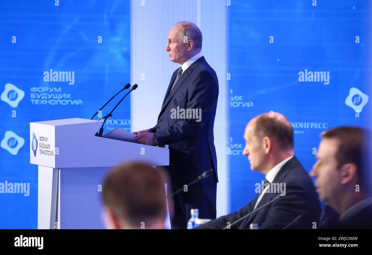 Moscow, Russia. 14th Feb, 2024. Russian President Vladimir Putin delivers remarks to the Future Technologies Forum at the Moscow World Trade Centre, February 14, 2024 in Moscow, Russia. The Future Technologies Forum showcases domestic scientific and medical progress. Credit: Alexander Kazakov/Kremlin Pool/Alamy Live News Stock Photo