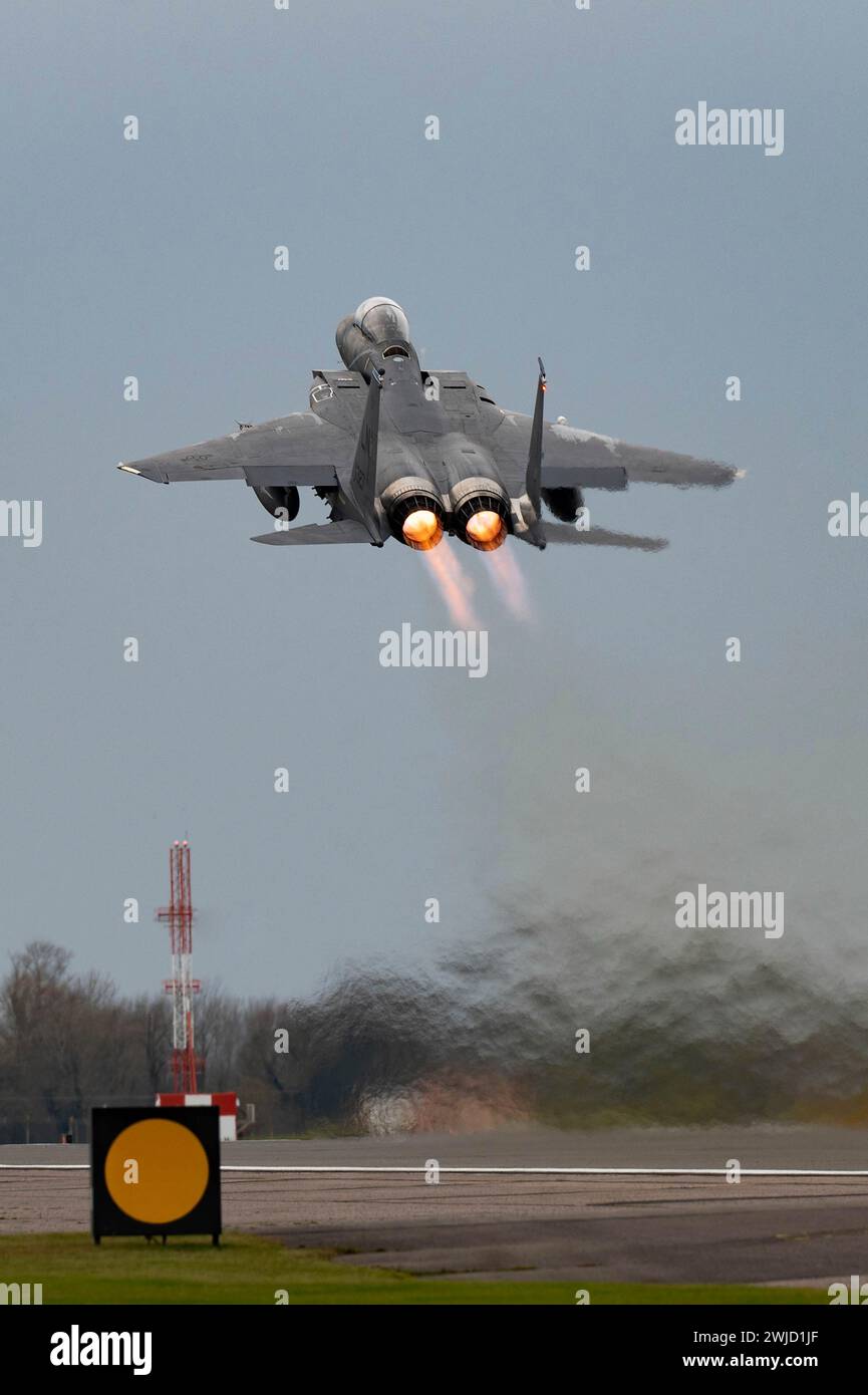 Suffolk, United Kingdom. 13th Feb, 2024. A U.S. Air Force F-15E Strike Eagle fighter aircraft assigned to the 492nd Fighter Squadron, takes off from RAF Lakenheath, February 13, 2024 in Suffolk, England, UK. Credit: A1C Alexander Vasquez/U.S Air Force/Alamy Live News Stock Photo