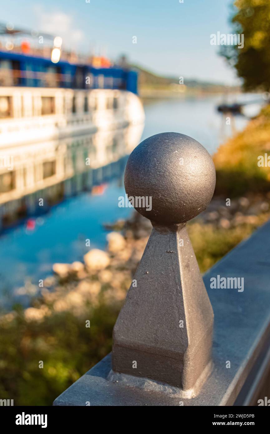 Summer view with details of a bridge railing and reflections at ...