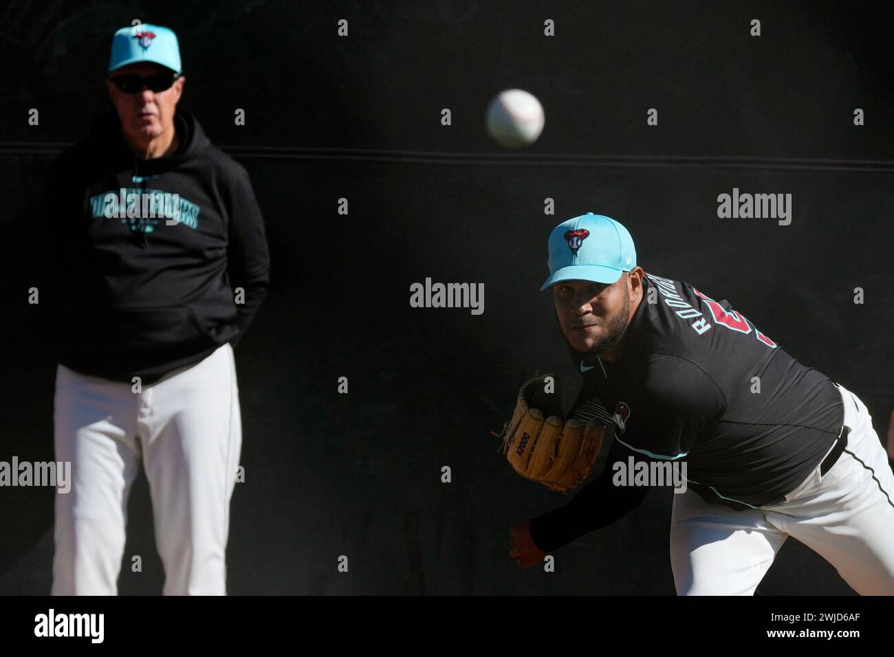Arizona Diamondbacks starting pitcher Eduardo Rodriguez, right, throws