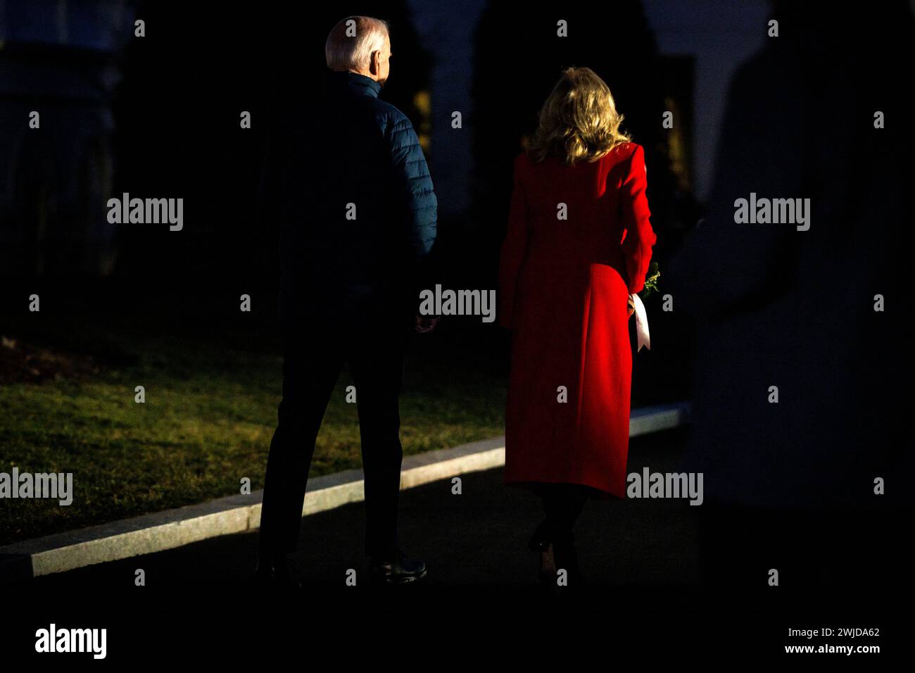 Washington, United States. 14th Feb, 2024. President Joe Biden and First Lady Jill Biden walk back to the West Wing after viewing Valentine's Day decorations on the North Lawn of the White House on February 14, 2024 in Washington, DC (Photo by Samuel Corum/Sipa USA) Credit: Sipa USA/Alamy Live News Stock Photo