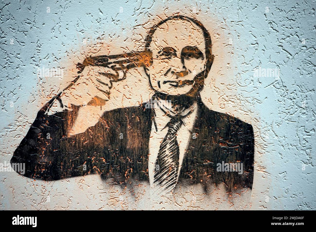 Graffity: der russische Praesident Wladimir Putin mit einer Pistole an der Schlaefe (nur fuer redaktionelle Verwendung. Keine Werbung. Referenzdatenba Stock Photo