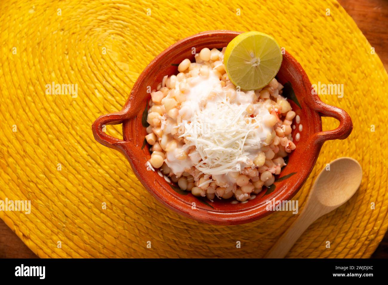 Esquites. Corn kernels cooked and served with mayo, sour cream, lemon