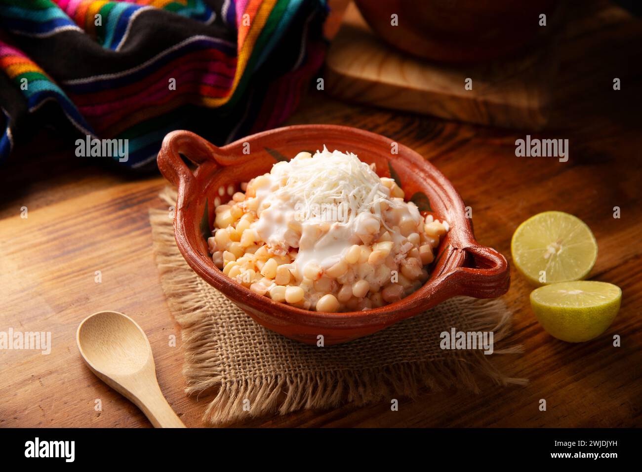 Esquites. Corn kernels cooked and served with mayo, sour cream, lemon