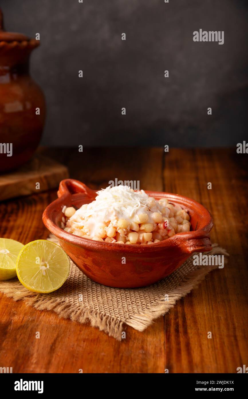 Esquites. Corn kernels cooked and served with mayo, sour cream, lemon