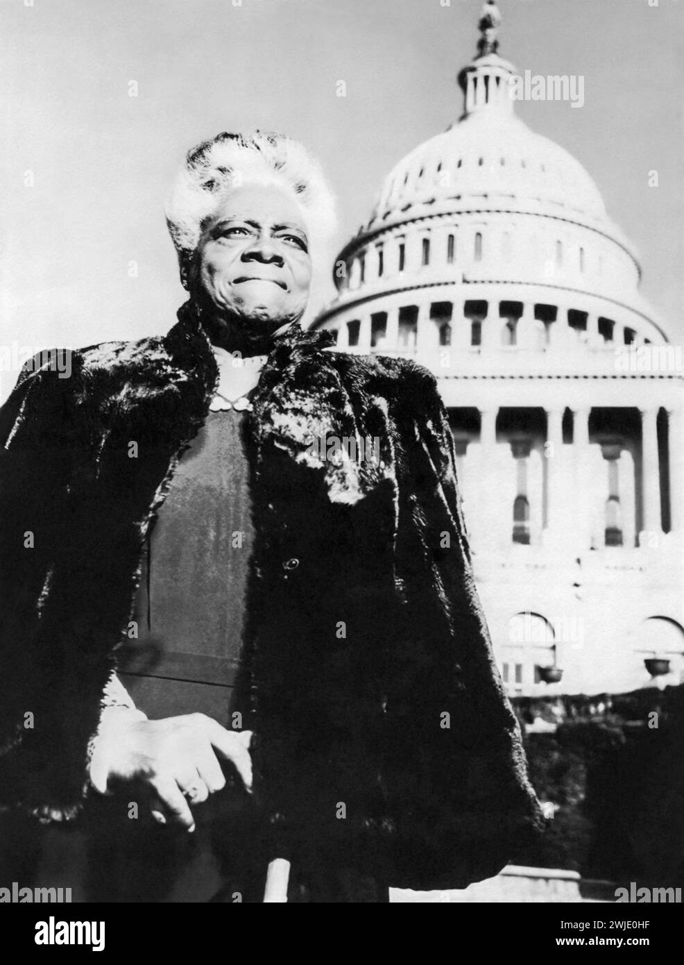 Mary McLeod Bethune (1875-1955) standing in front of the U.S. Capitol Building in Washington, D.C., in 1954. (USA) Stock Photo