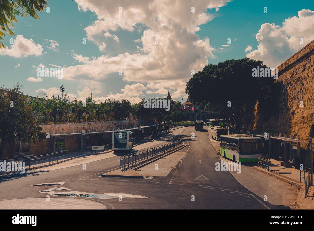 Valletta bus station, bus depot in the centre of the town, main city of Malta. Some buses are waiting to depart on different destinations on malta. Stock Photo