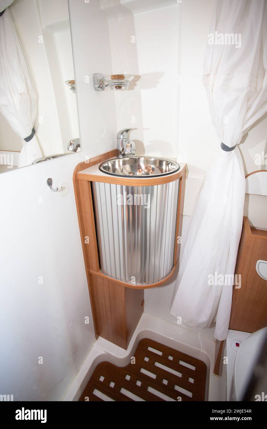 Camper interior Bathroom modern vanlife sink van RV washroom toilet sink shower cabinet Stock ...