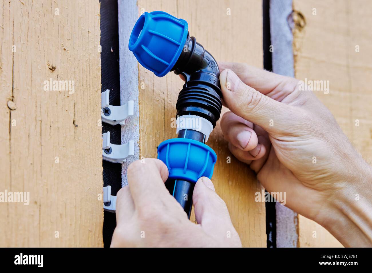 Compression elbow clamp fitting for water systems and pipeline, used