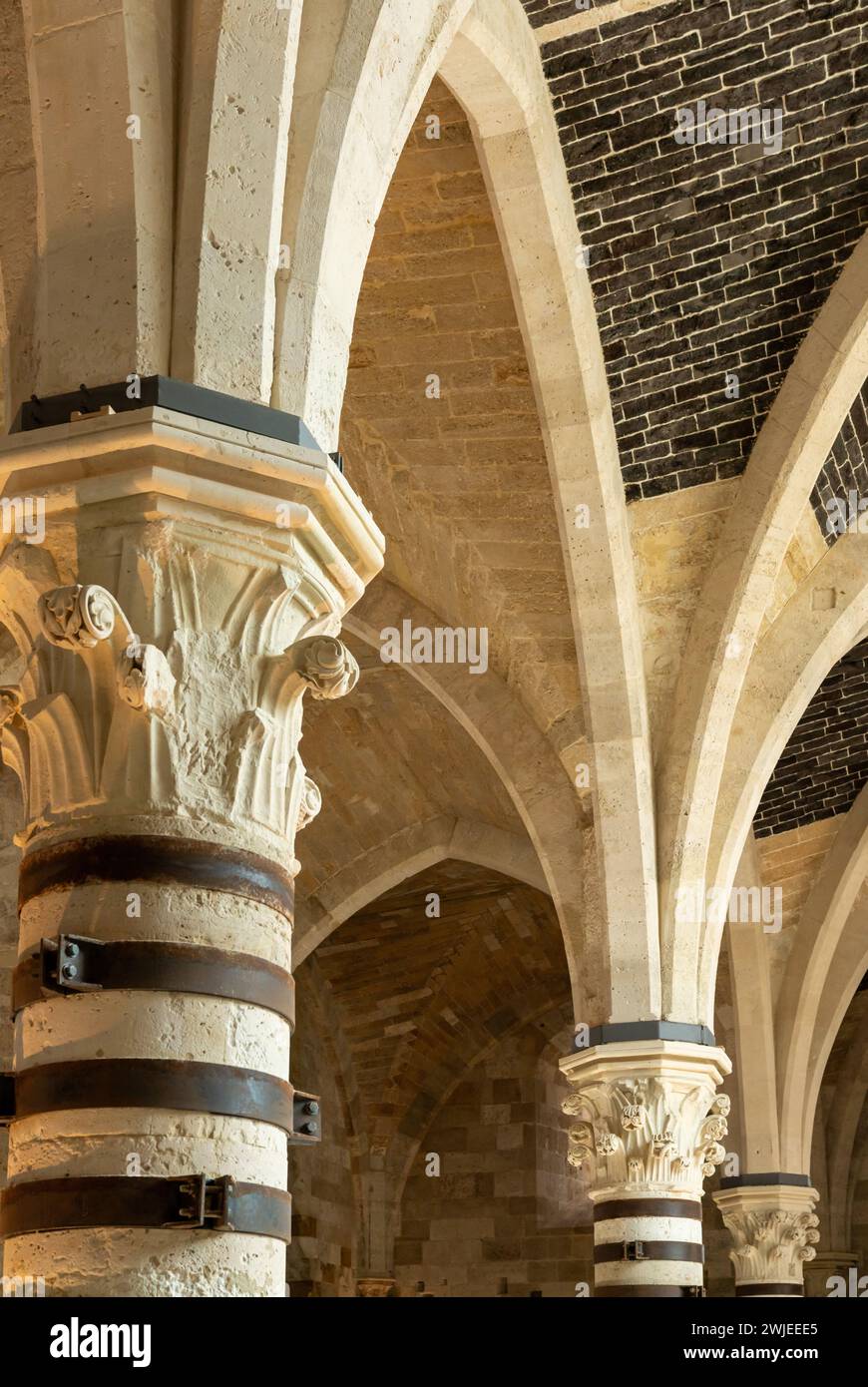 Syracuse, Italy - 28 December, 2023: architectural detail of the columns inside the main hall of the Maniace Castle in Siracusa Stock Photo