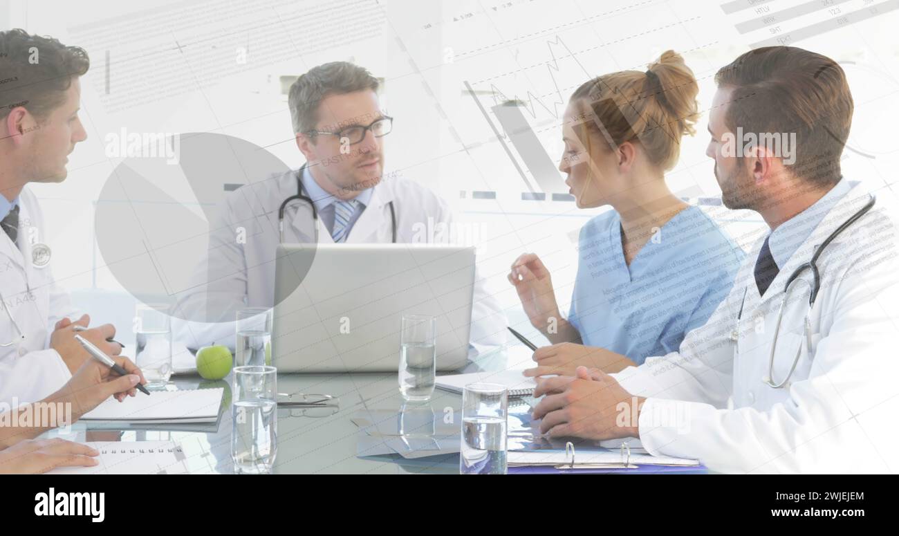 Doctors meet with dynamic graphs and charts Stock Photo