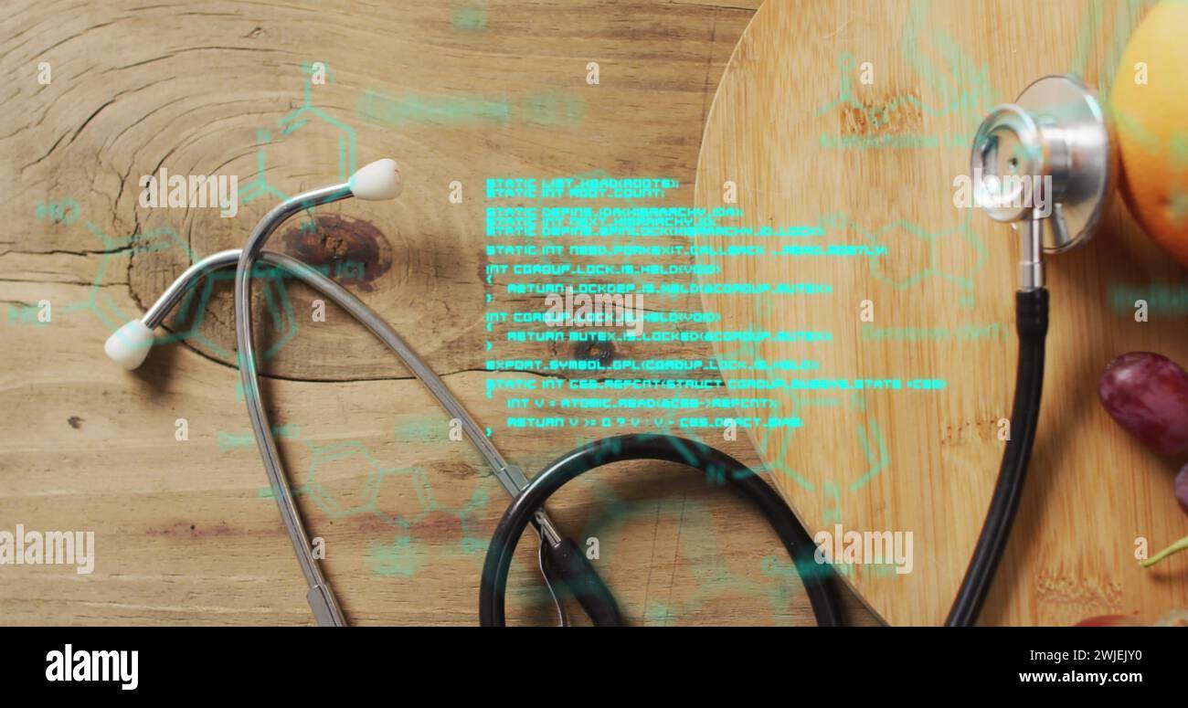 Image of data processing over stethoscope and fruit Stock Photo