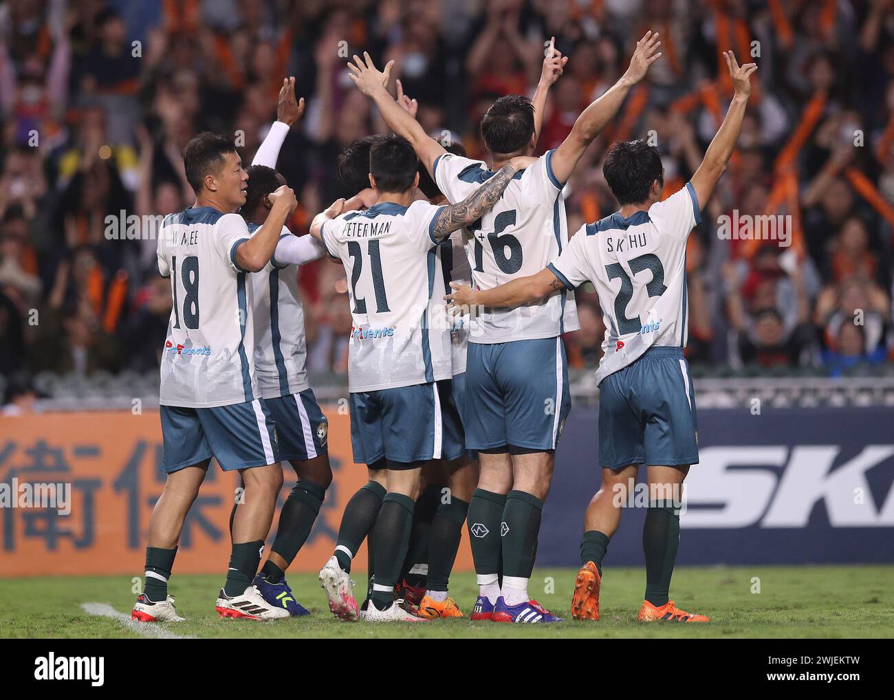 Hong Kong legends celebrate after scoring a goal during the FWD