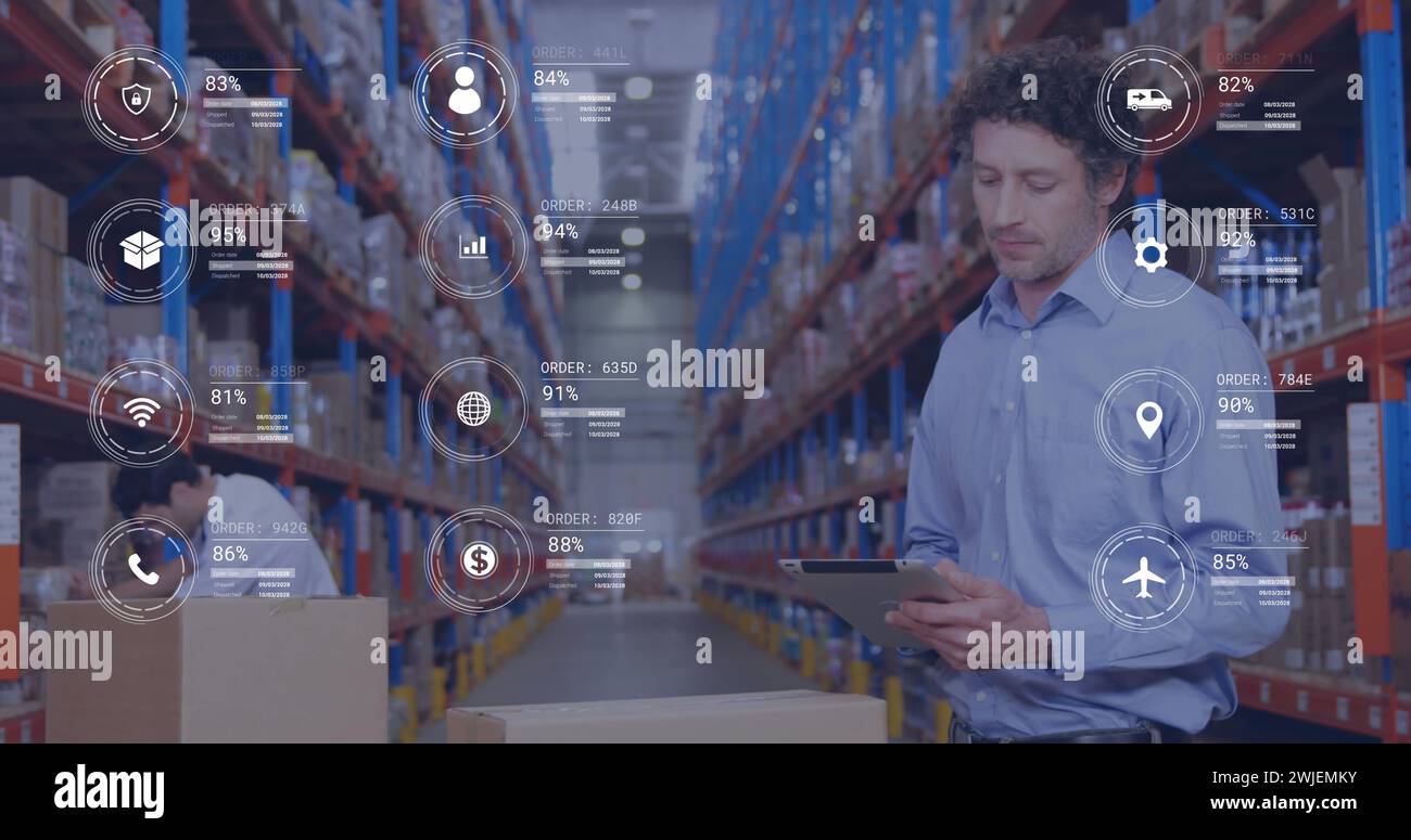 Image of icons with data processing over caucasian male worker using tablet in warehouse Stock Photo