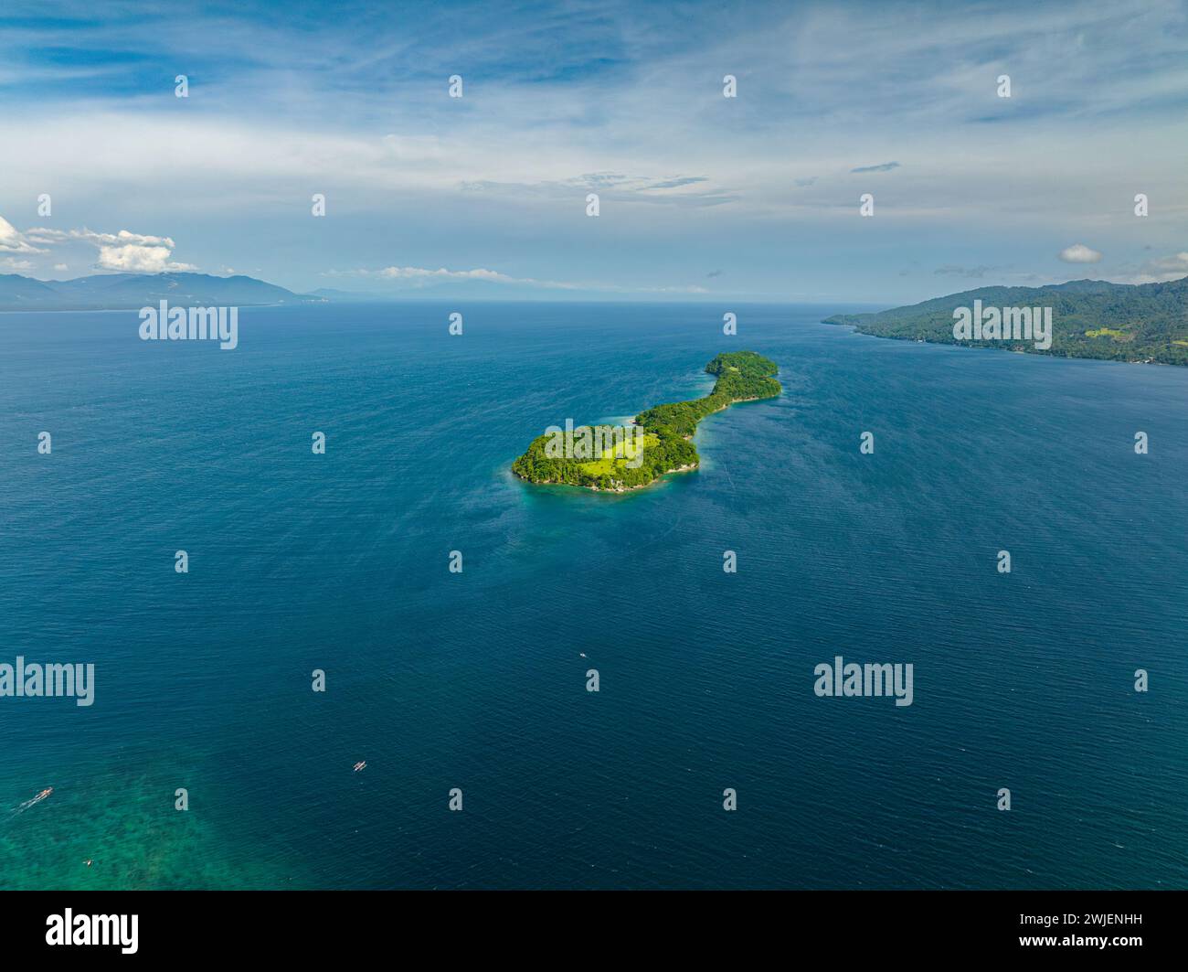 Seascape with a piece of land surrounded by water. Samal Island. Davao