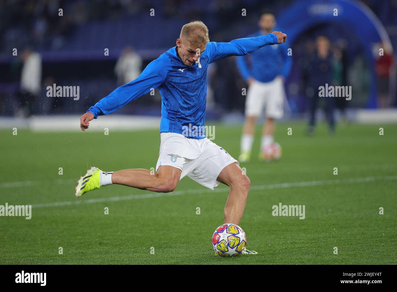 Rome, Italie. 14th Feb, 2024. Gustav Isaksen of Lazio kicks the ball during warm up before the UEFA Champions League, Round of 16, 1st leg football match between SS Lazio and Bayern Munich on February 14, 2024 at Stadio Olimpico in Rome, Italy - Photo Federico Proietti/DPPI Credit: DPPI Media/Alamy Live News Stock Photo