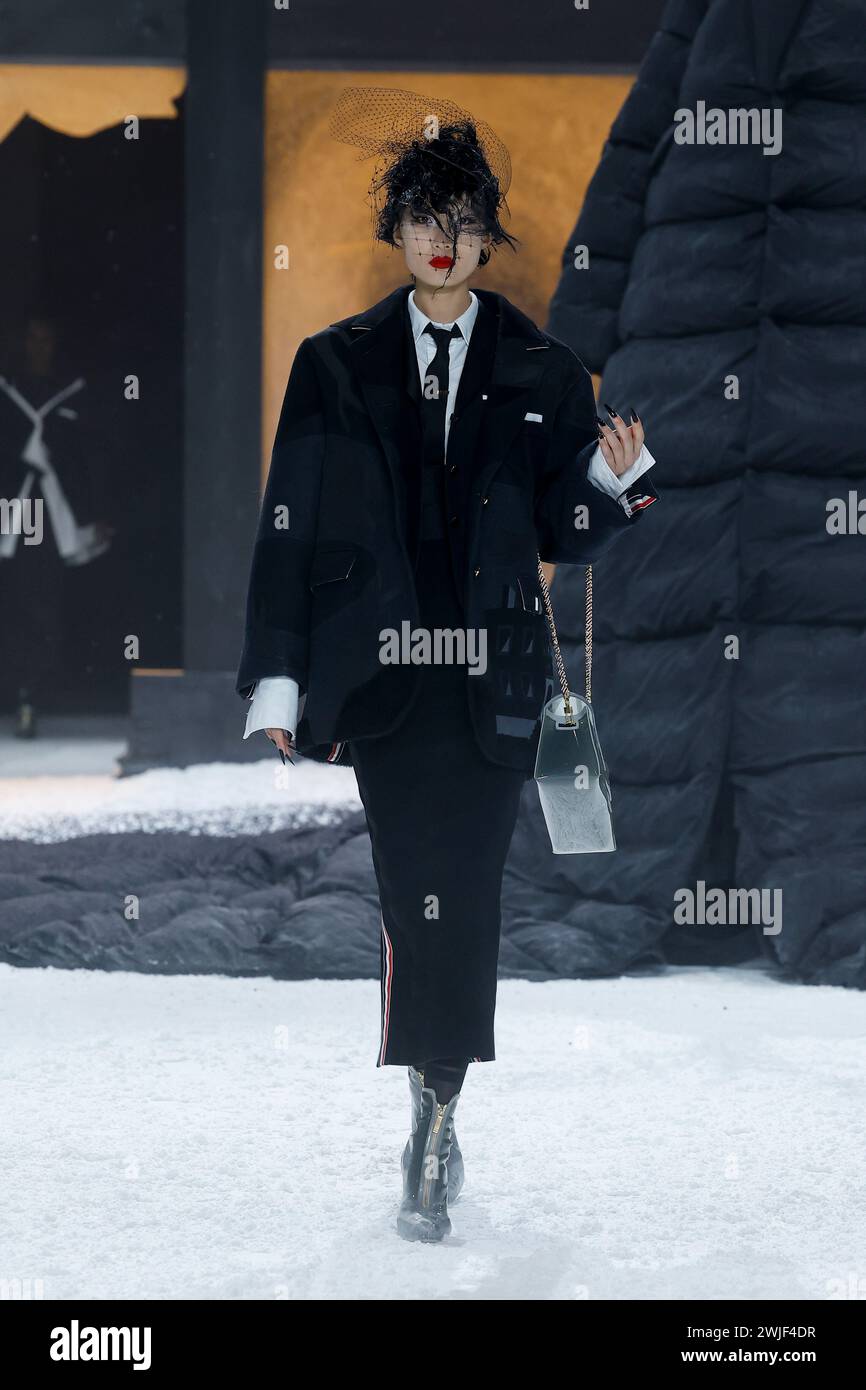 Model walks on the runway at the Thom Browne fashion show during the