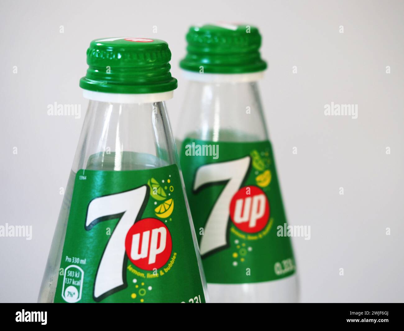 Bavaria, Germany -February 15, 2024: In this photo illustration, glass bottle of 7up Stock Photo