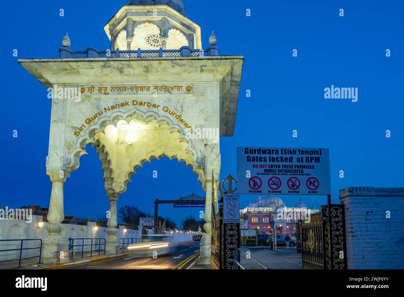 The entrance to Siri Guru Nanak Darbar Gurdwara Gravesend kent at dusk. Stock Photo