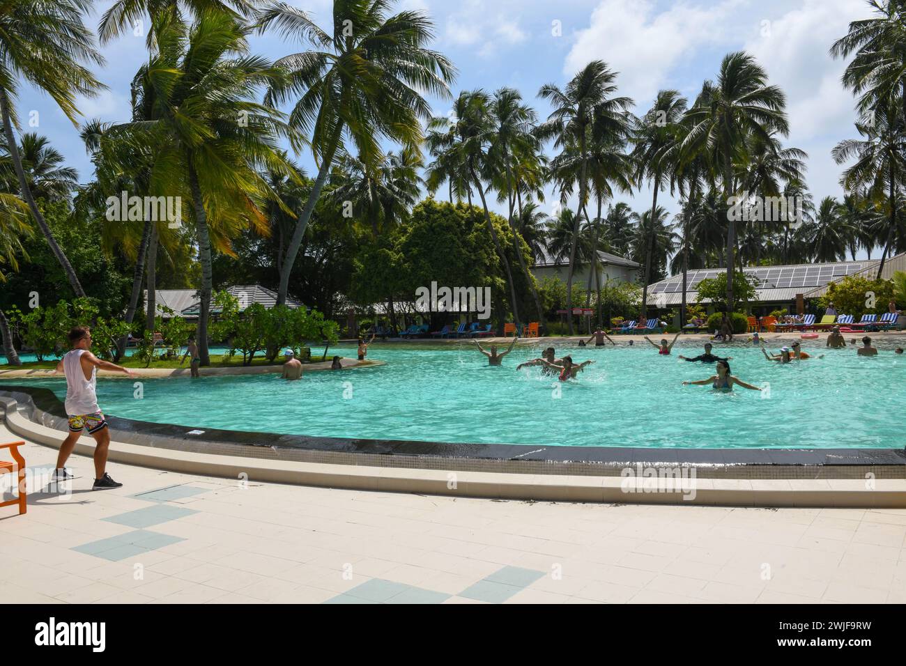 Villa Park, Maldives - 27 December 2023: people practicing aqua aerobics at Villa Park resort on Ari atoll in Maldives Stock Photo