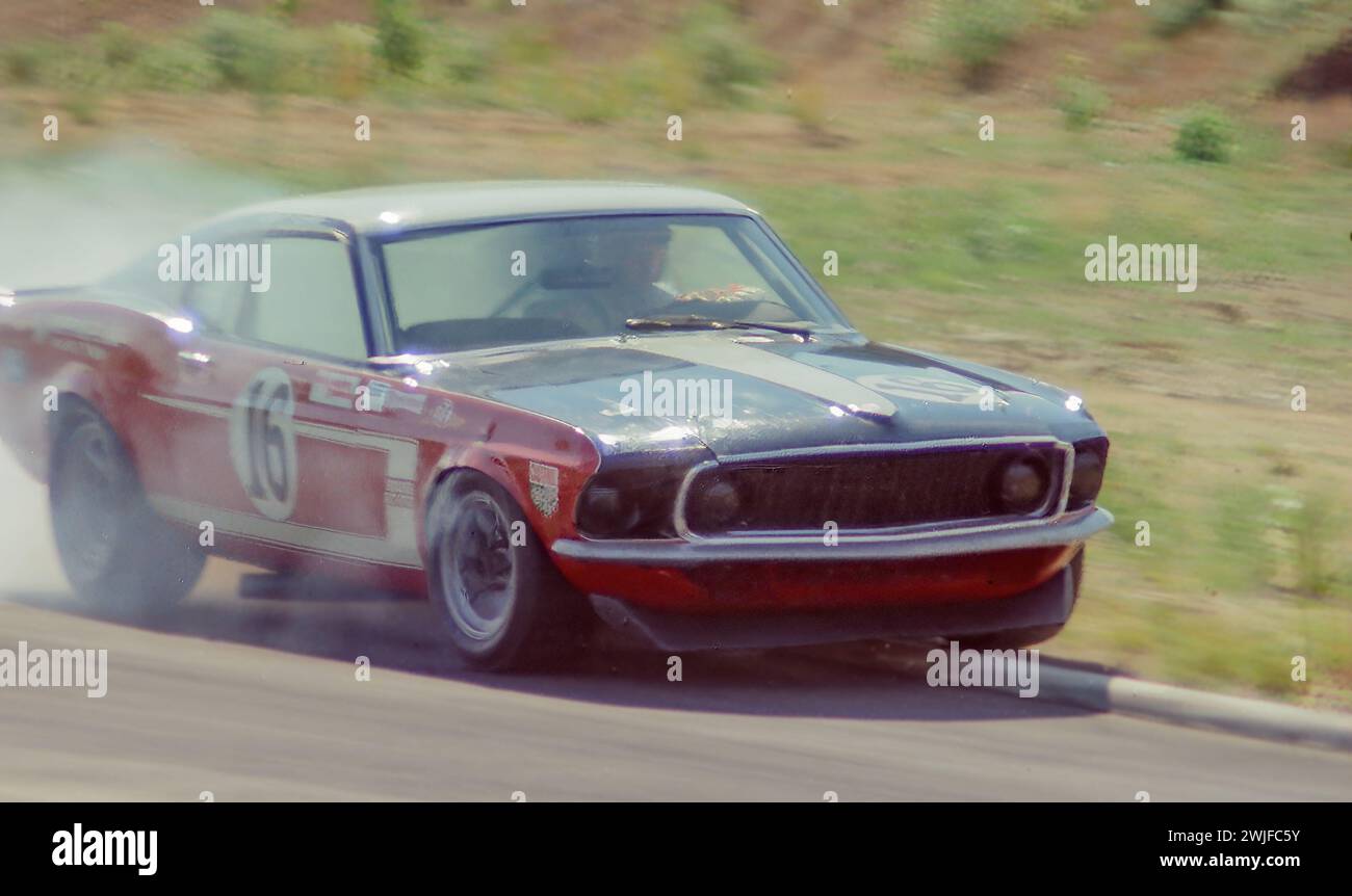 George Follmer driving a Bud Moore Ford Mustang Boss 302 at the 1969 Trans-Am at  Circuit Mont-Tremblant in St. Jovite, Quebec, DNF Stock Photo