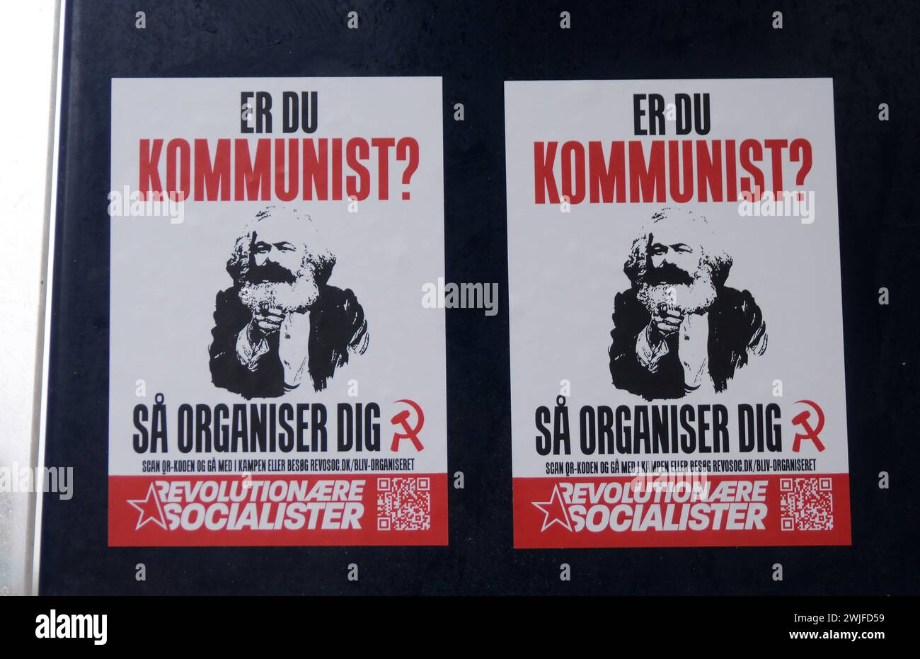 Copenhagen, Denmark /15 February  2024/.Two smll billboard read if you communist to join revolation socialists  billboar on bus stop styand in Copenhagen.    (Photo.Francis Joseph Dean/Dean Pictures) Stock Photo