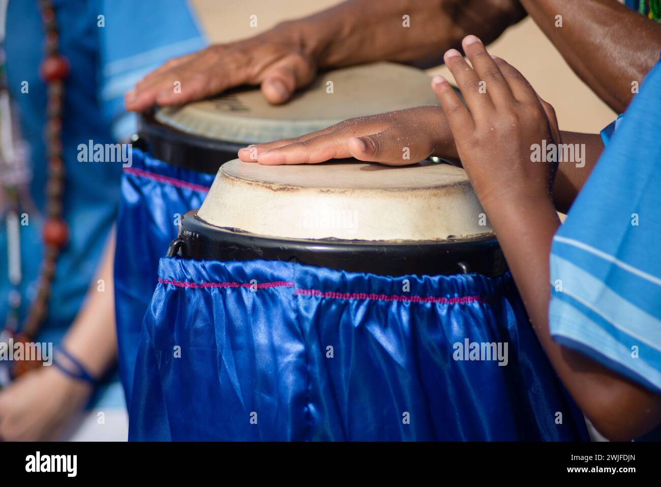 Percussionist hands playing atabaque. musical rhythm. African music. Tribute to Iemanja. Stock Photo