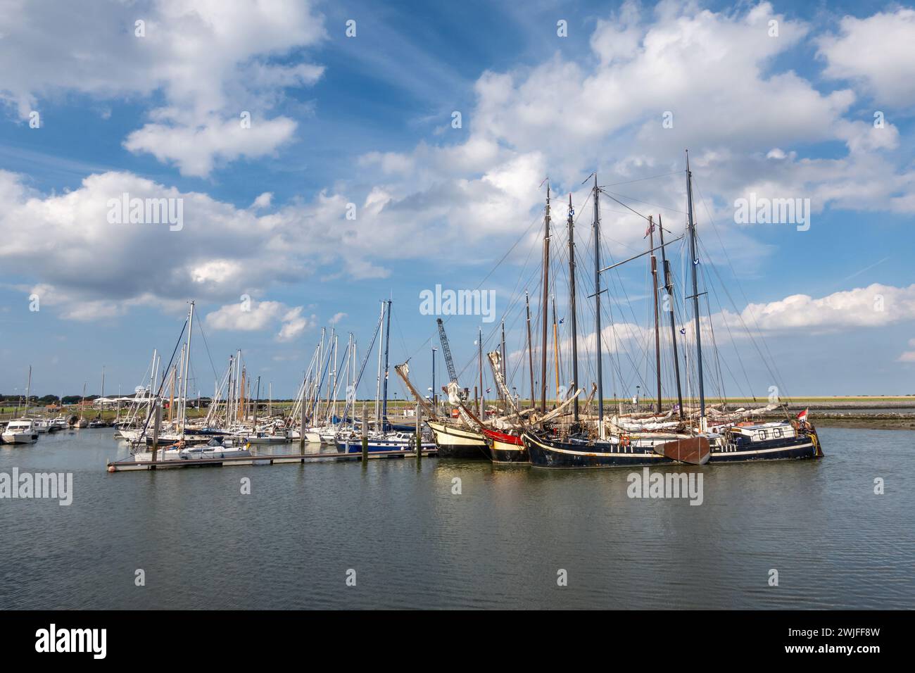 Sailing boats in Waddenhaven Marina on the West Frisian island of Ameland, located at the Wadden Sea, Netherlands Stock Photo